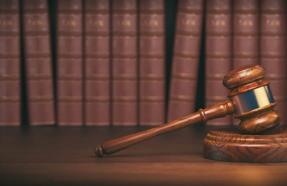 gavel on the background of vintage lawyer books concept of law 1.jpg